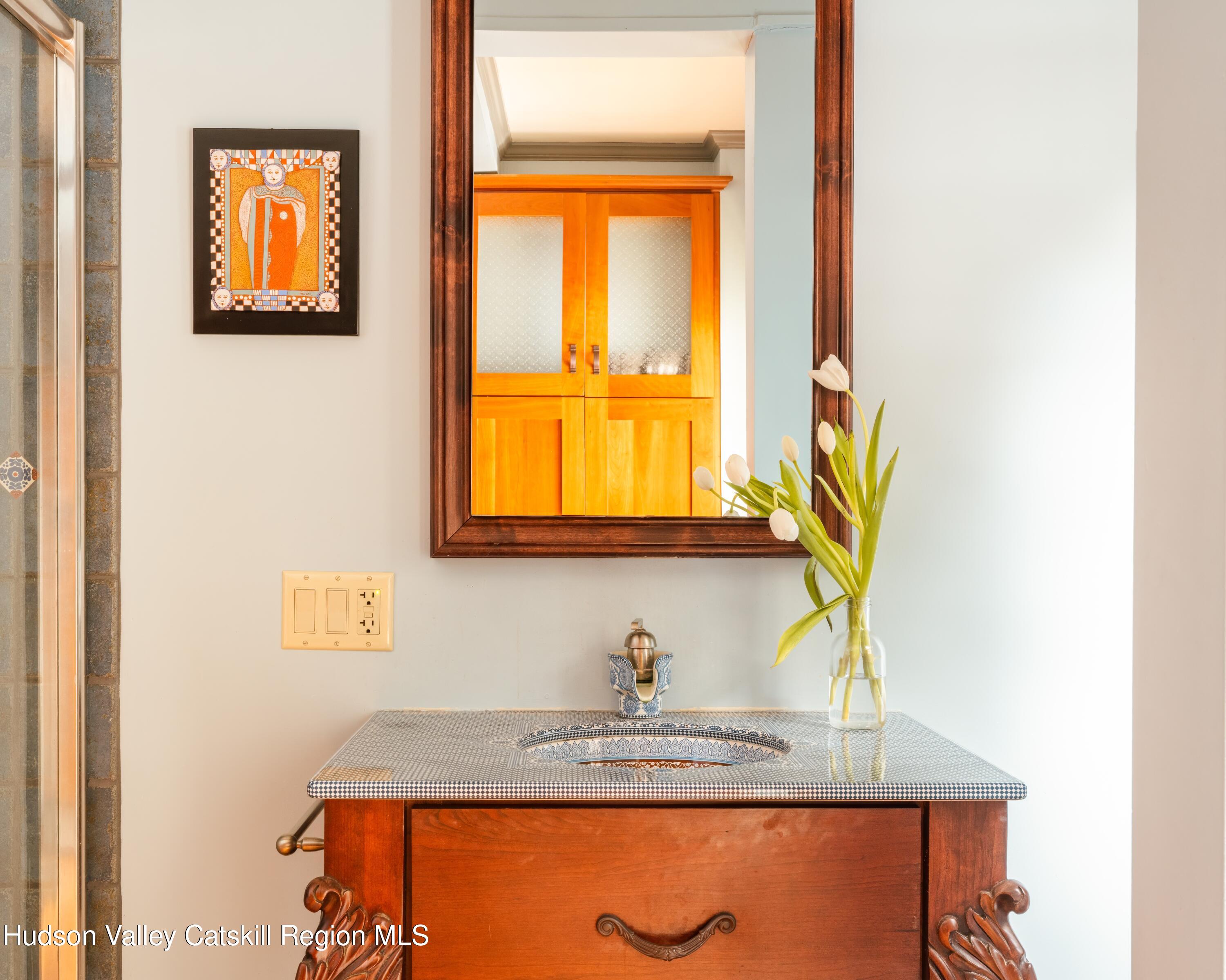 72 High Point Mountain Road West Shokan, NY 12494 - Photo 17 of 33 a bathroom with a granite countertop sink and a window