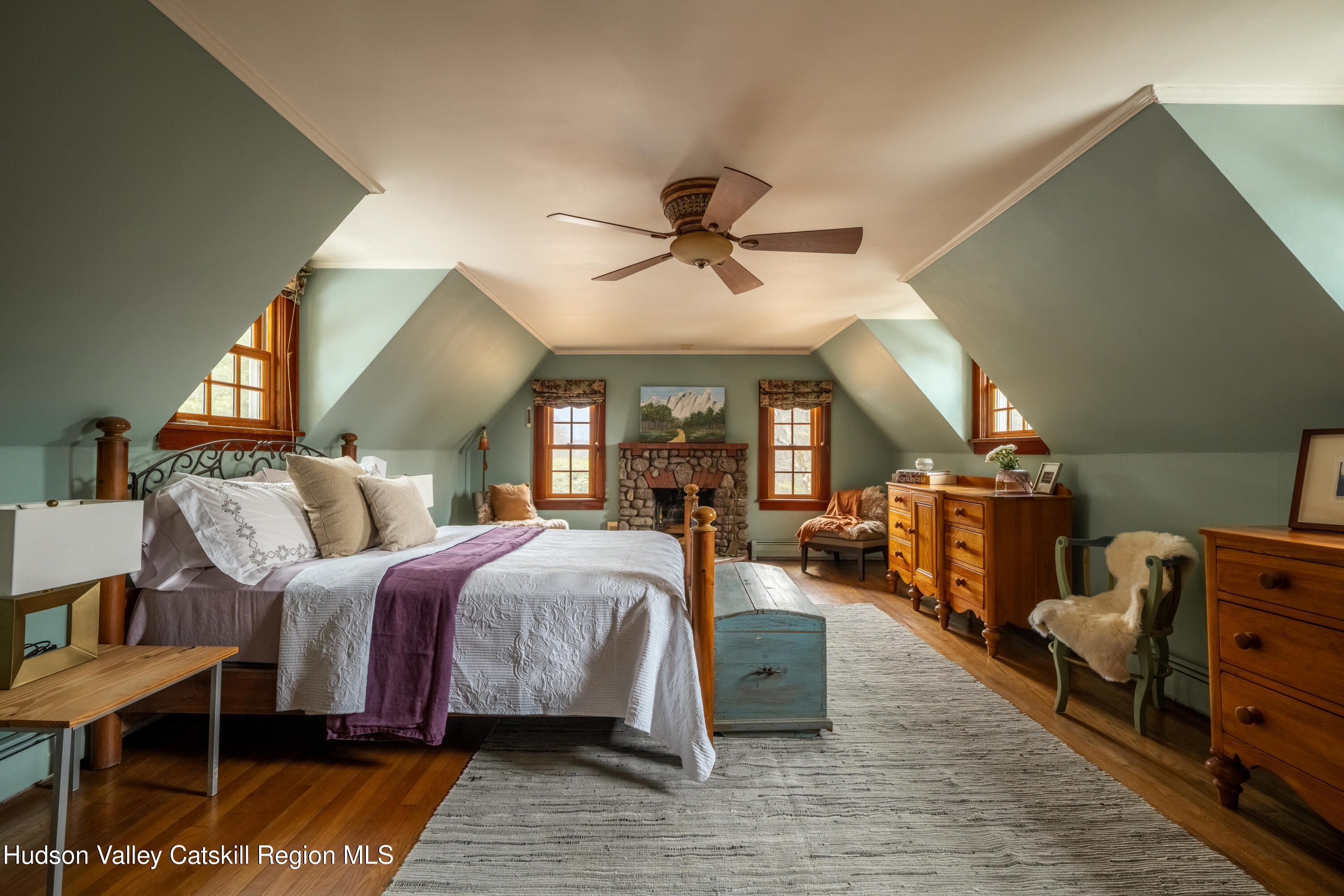 72 High Point Mountain Road West Shokan, NY 12494 - Photo 19 of 33 a bed room with bed and a chandelier