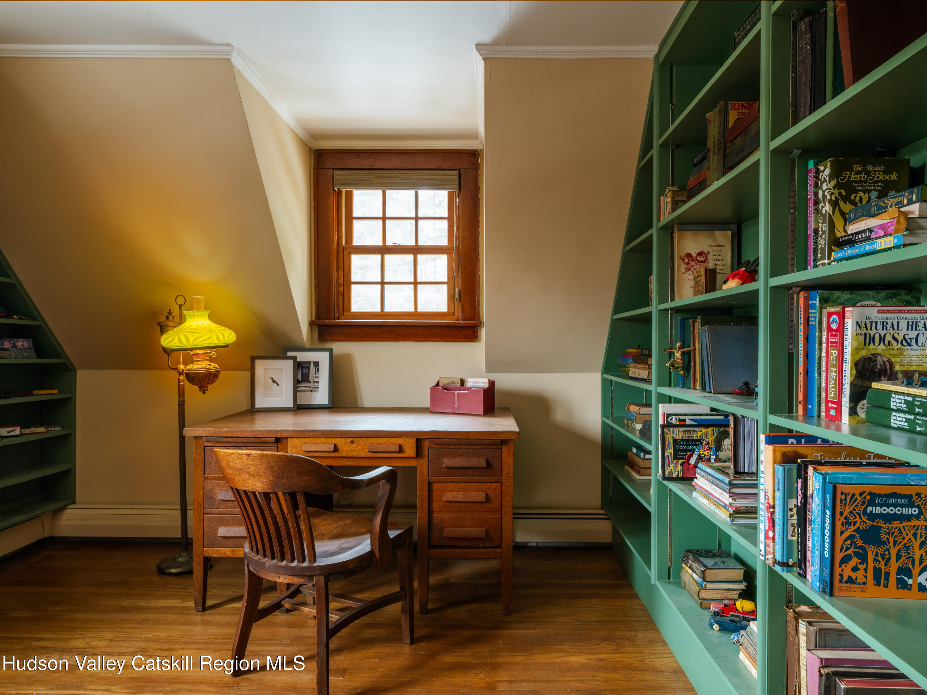 72 High Point Mountain Road West Shokan, NY 12494 - Photo 26 of 33 a room with furniture a rug and a book shelf