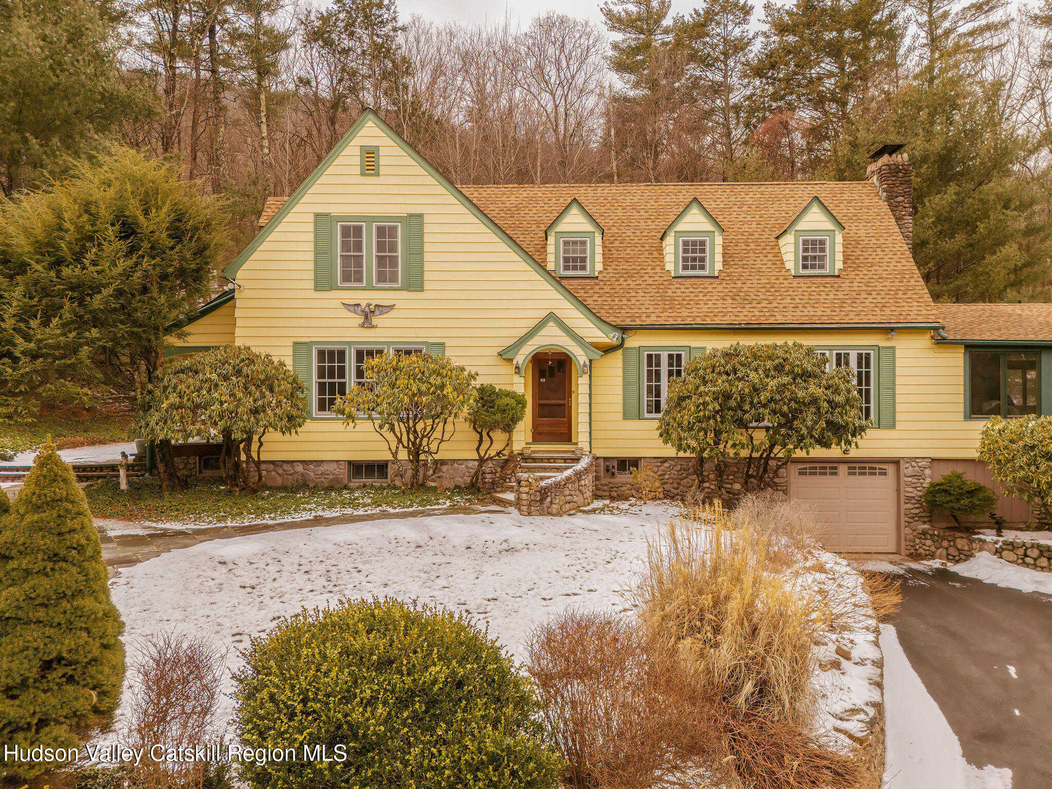 72 High Point Mountain Road West Shokan, NY 12494 - Photo 30 of 33 a view of a white house with large windows next to a road