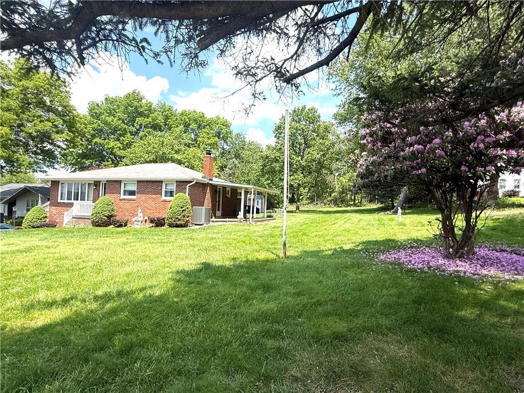 151 Huntingdon Road Wyano, PA 15695 - Photo 15 of 36 a view of a house with a big yard