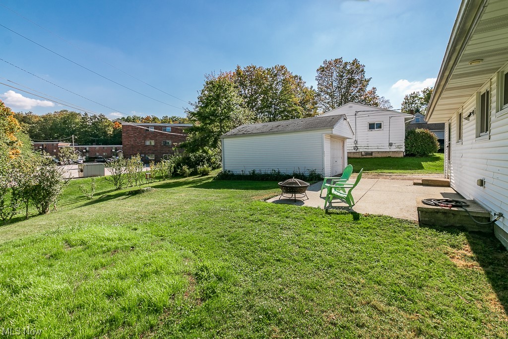 308 Wilson Mills Road Chardon, OH 44024 - Photo 3 of 21 View of yard with a patio area and a fire pit