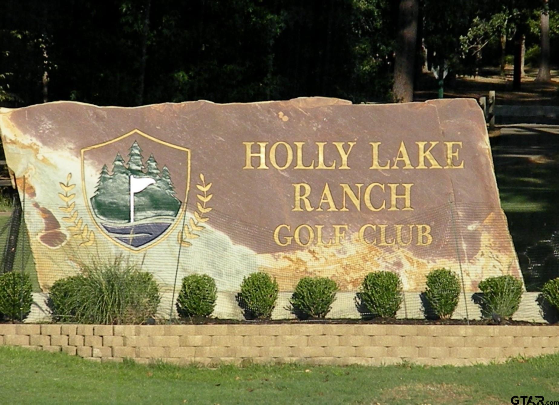 175 Old Gate Path Holly Lake Ranch, TX 75755 - Photo 2 of 28 a sign that is on the side of a building