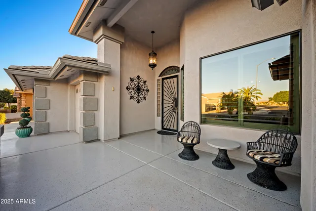 a view of a livingroom with furniture and front door