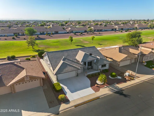 an aerial view of a house with a outdoor space