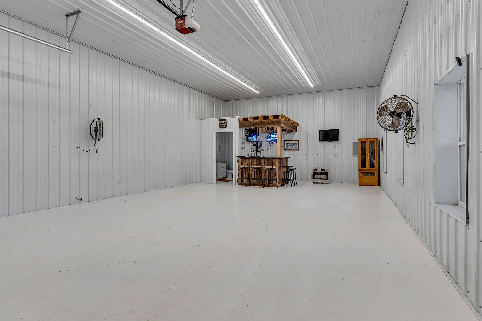 5574 Dowlen Road Cedar Hill, TN 37032 - Photo 52 of 59 a view of a storage & utility room with a window