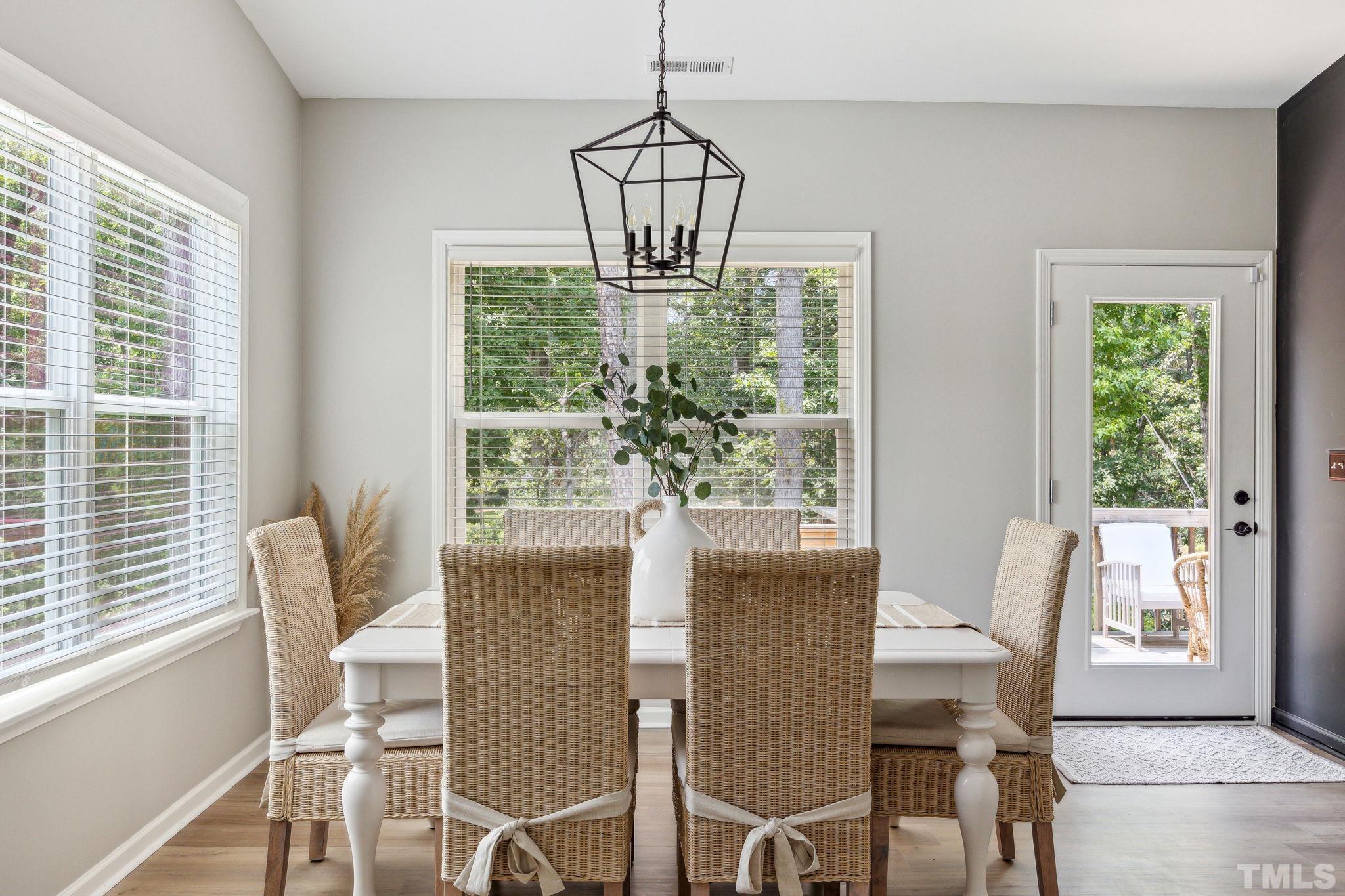 505 Miners Loop Sanford, NC 27330 - Photo 16 of 45 a view of a dining room with furniture window and outside view