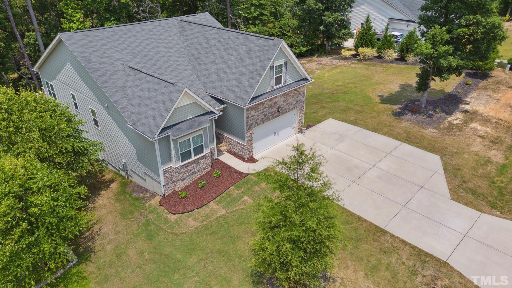 505 Miners Loop Sanford, NC 27330 - Photo 2 of 45 an aerial view of a house with a yard basket ball court and outdoor seating