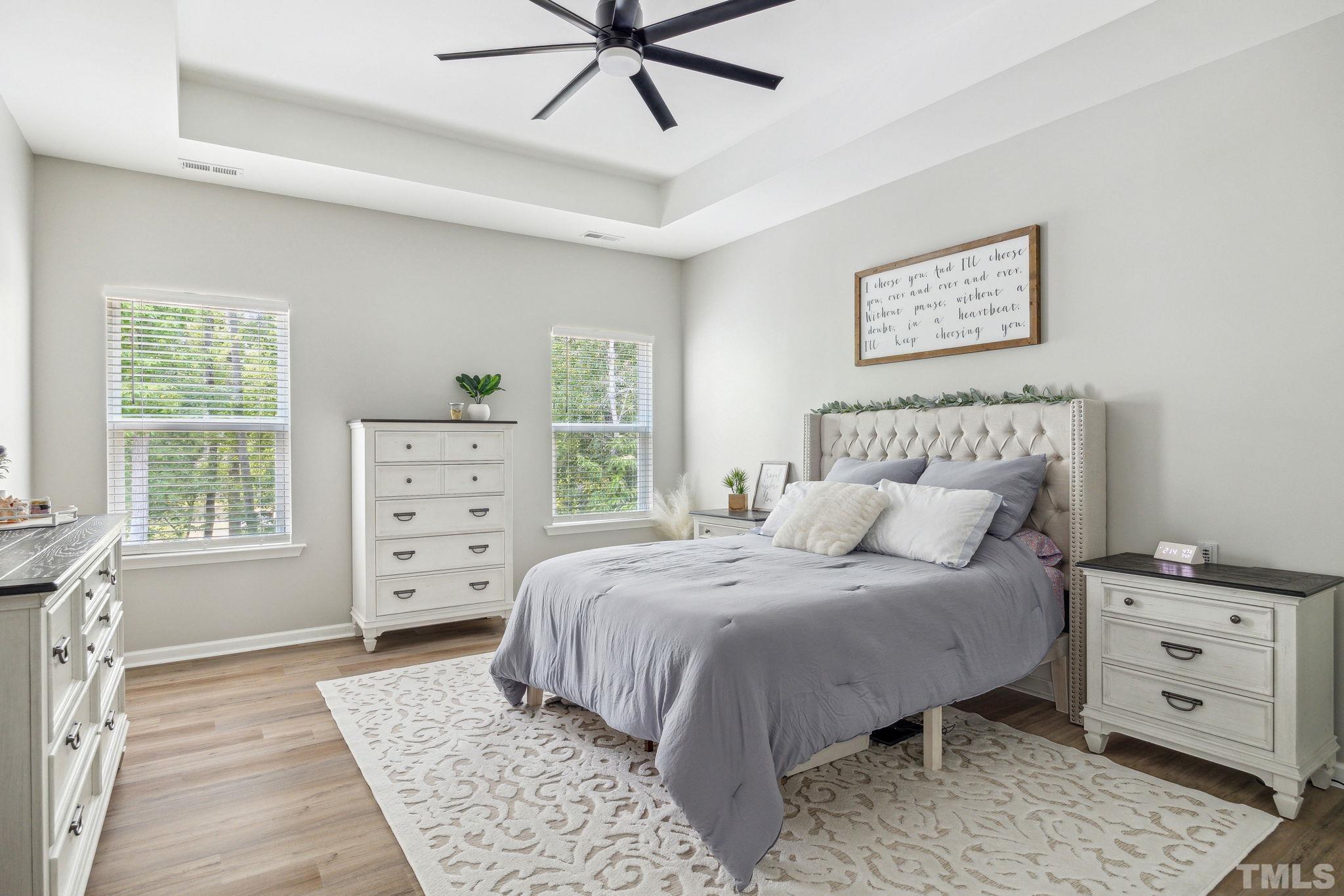 505 Miners Loop Sanford, NC 27330 - Photo 24 of 45 a bedroom with a bed and a dresser