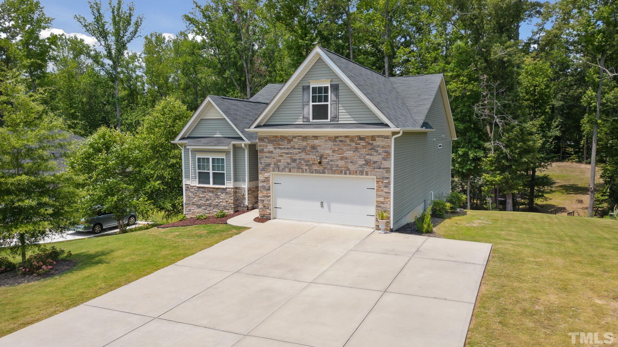 505 Miners Loop Sanford, NC 27330 - Photo 3 of 45 a front view of a house with a yard