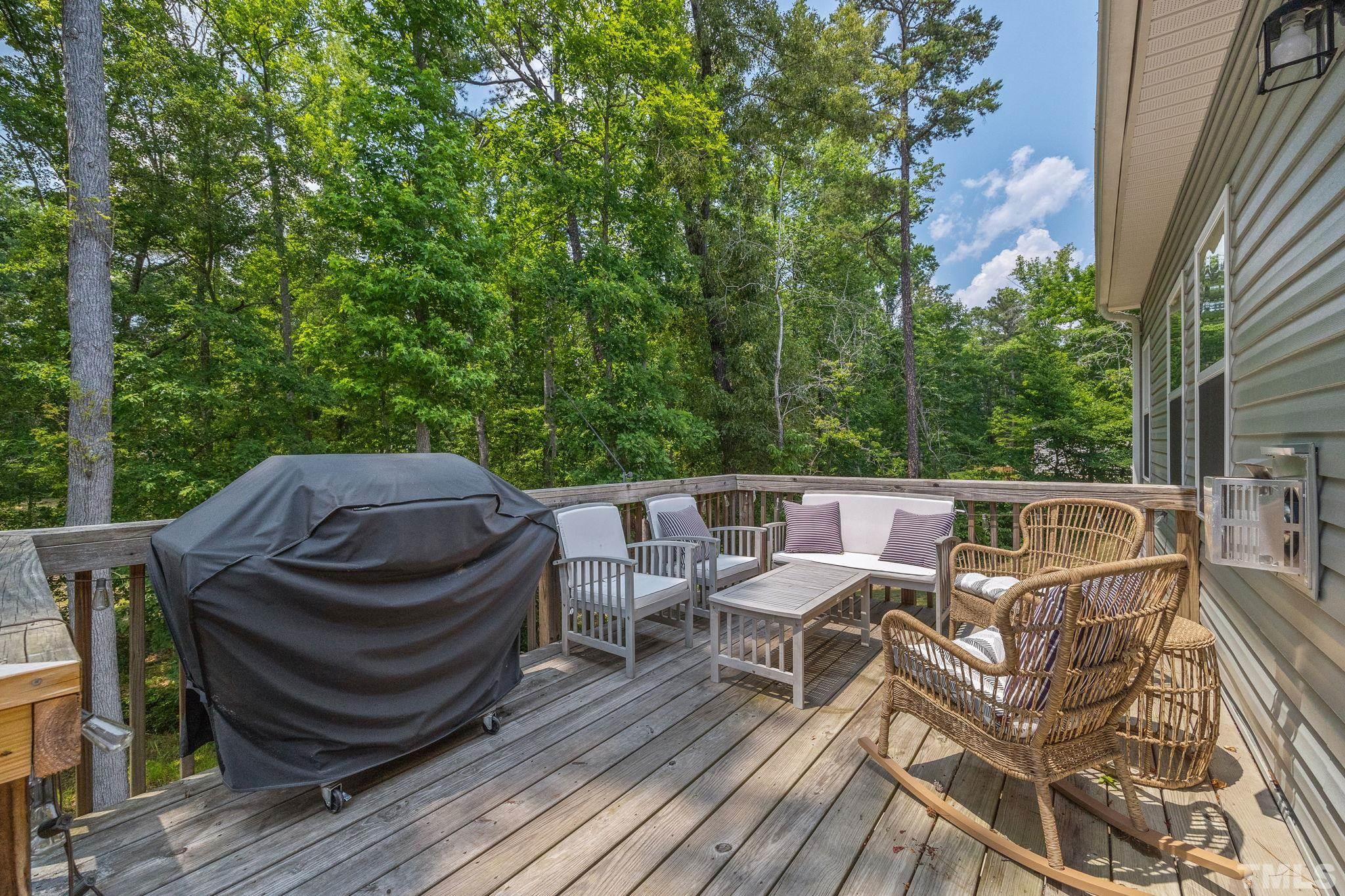 505 Miners Loop Sanford, NC 27330 - Photo 31 of 45 a view of a patio in a backyard