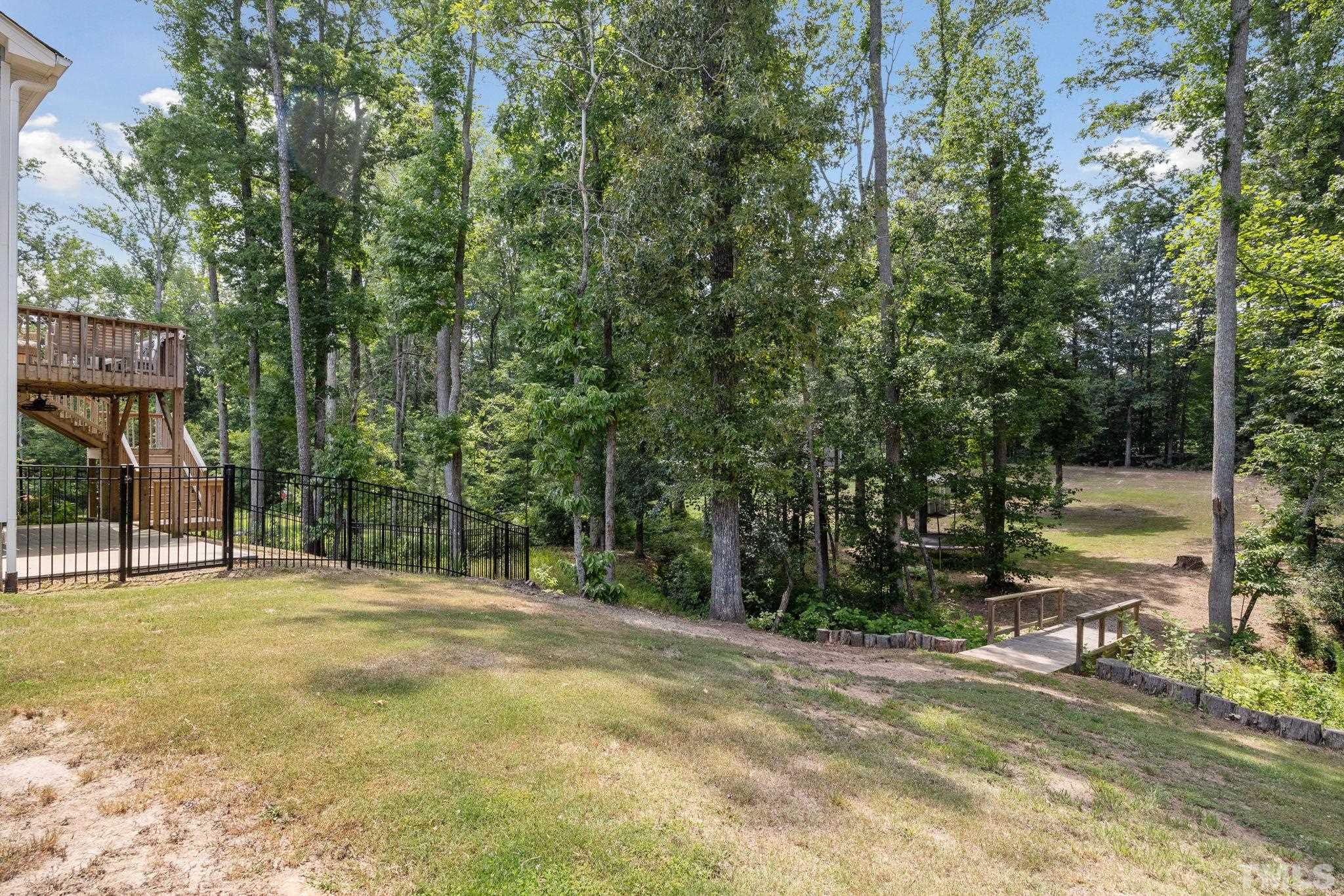 505 Miners Loop Sanford, NC 27330 - Photo 35 of 45 a view of a house with a yard