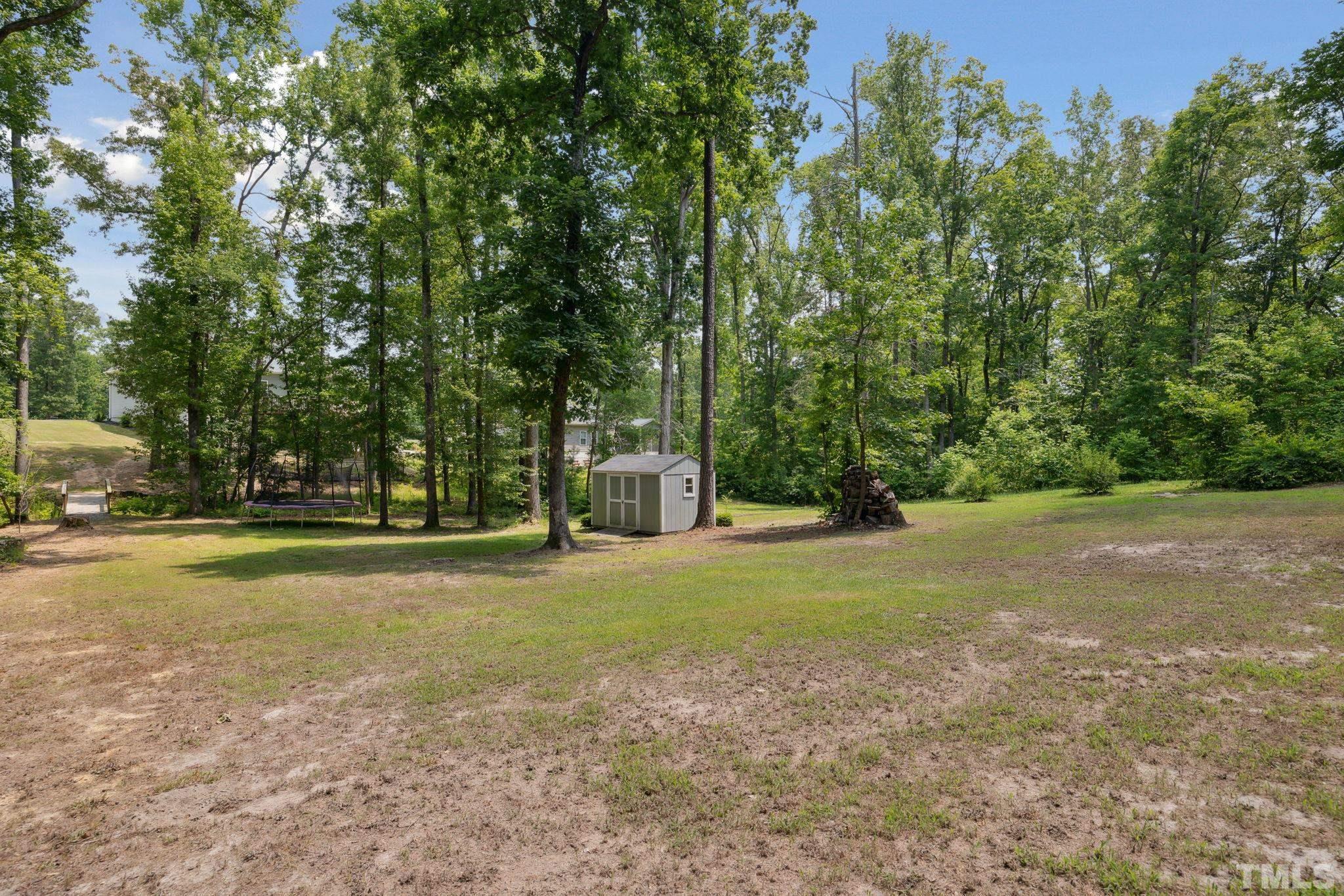 505 Miners Loop Sanford, NC 27330 - Photo 36 of 45 a view of a trees in a yard