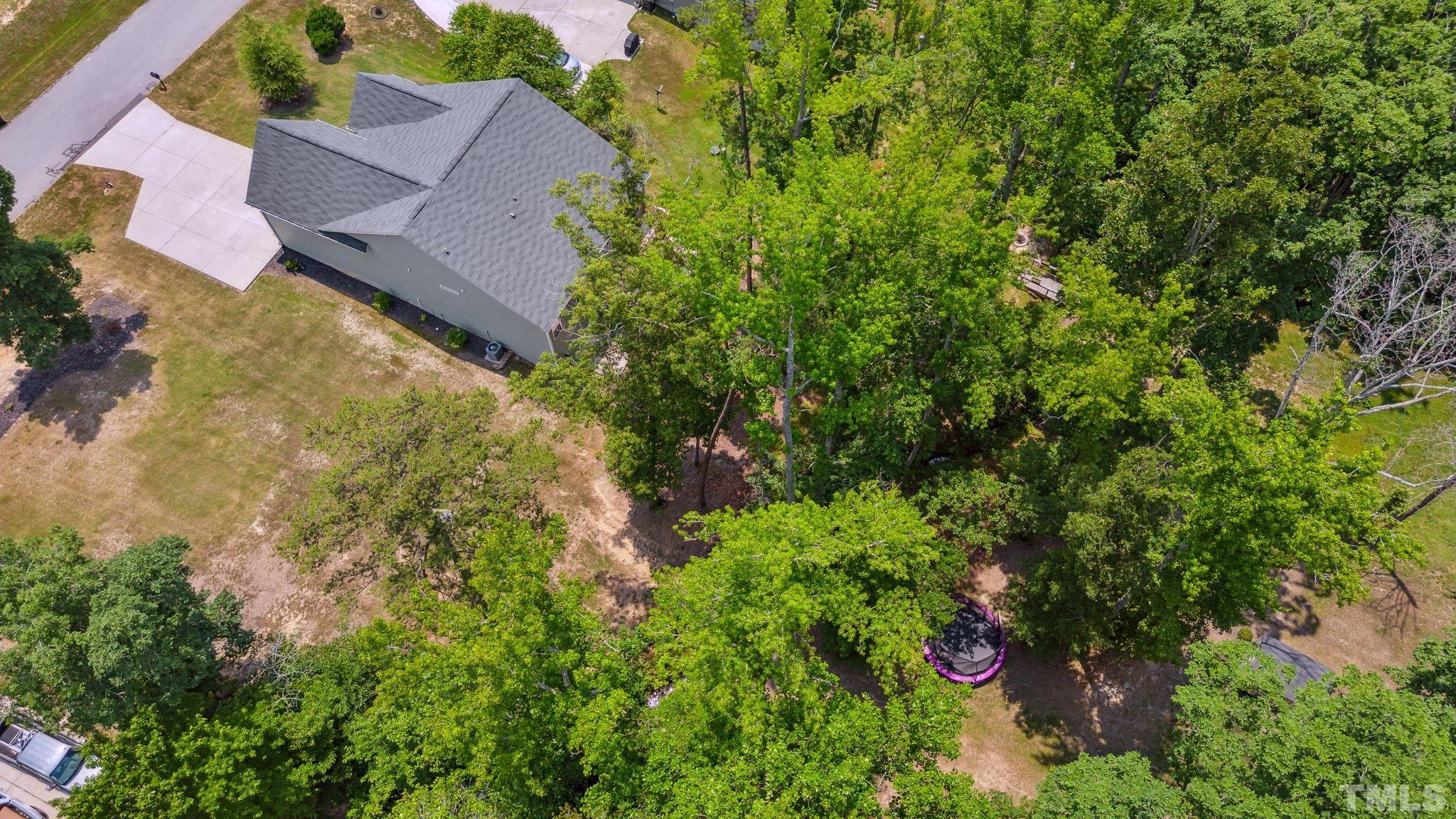 505 Miners Loop Sanford, NC 27330 - Photo 39 of 45 an aerial view of a house with swimming pool and garden