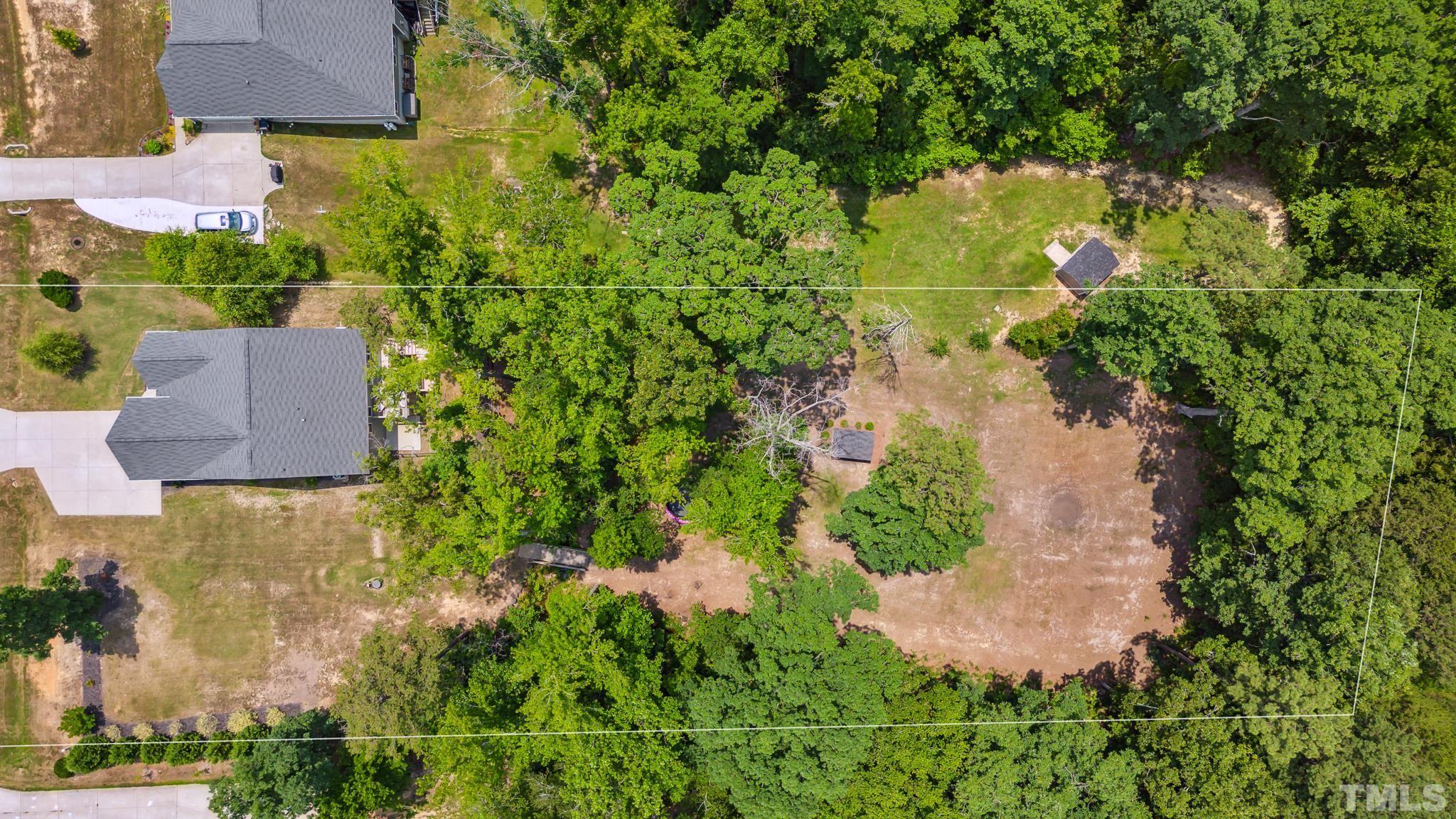 505 Miners Loop Sanford, NC 27330 - Photo 41 of 45 an aerial view of residential house with outdoor space and trees all around
