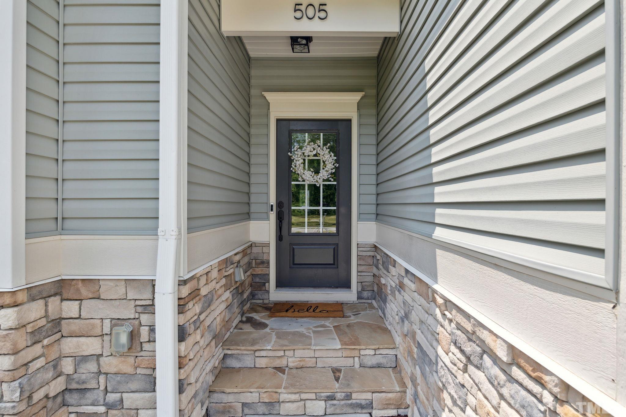 505 Miners Loop Sanford, NC 27330 - Photo 5 of 45 a view of a entryway door of the house