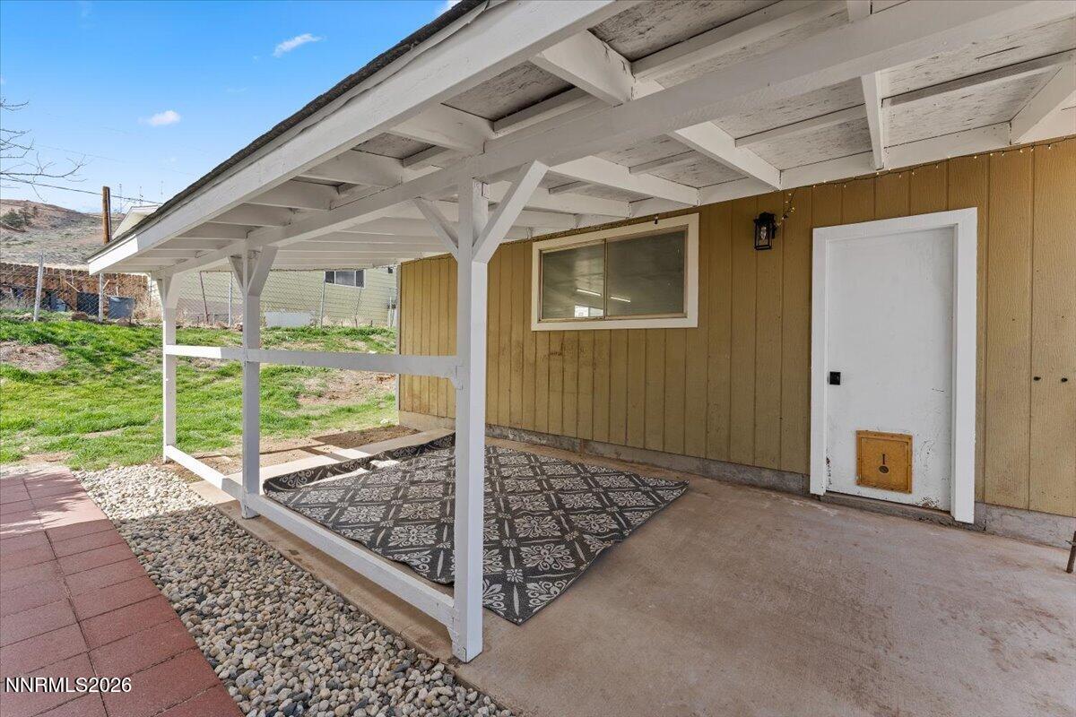 384 Loster Way Sun Valley, NV 89433 - Photo 32 of 35 a view of a porch