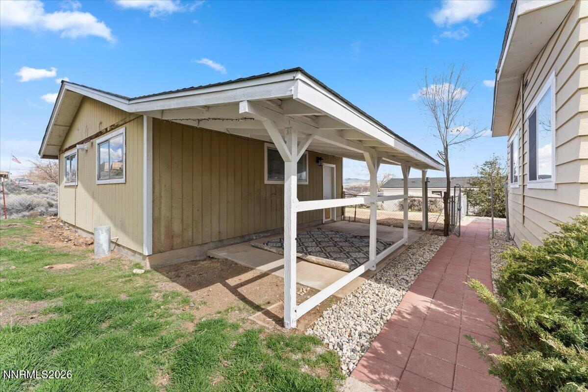 384 Loster Way Sun Valley, NV 89433 - Photo 35 of 35 a view of a house with backyard