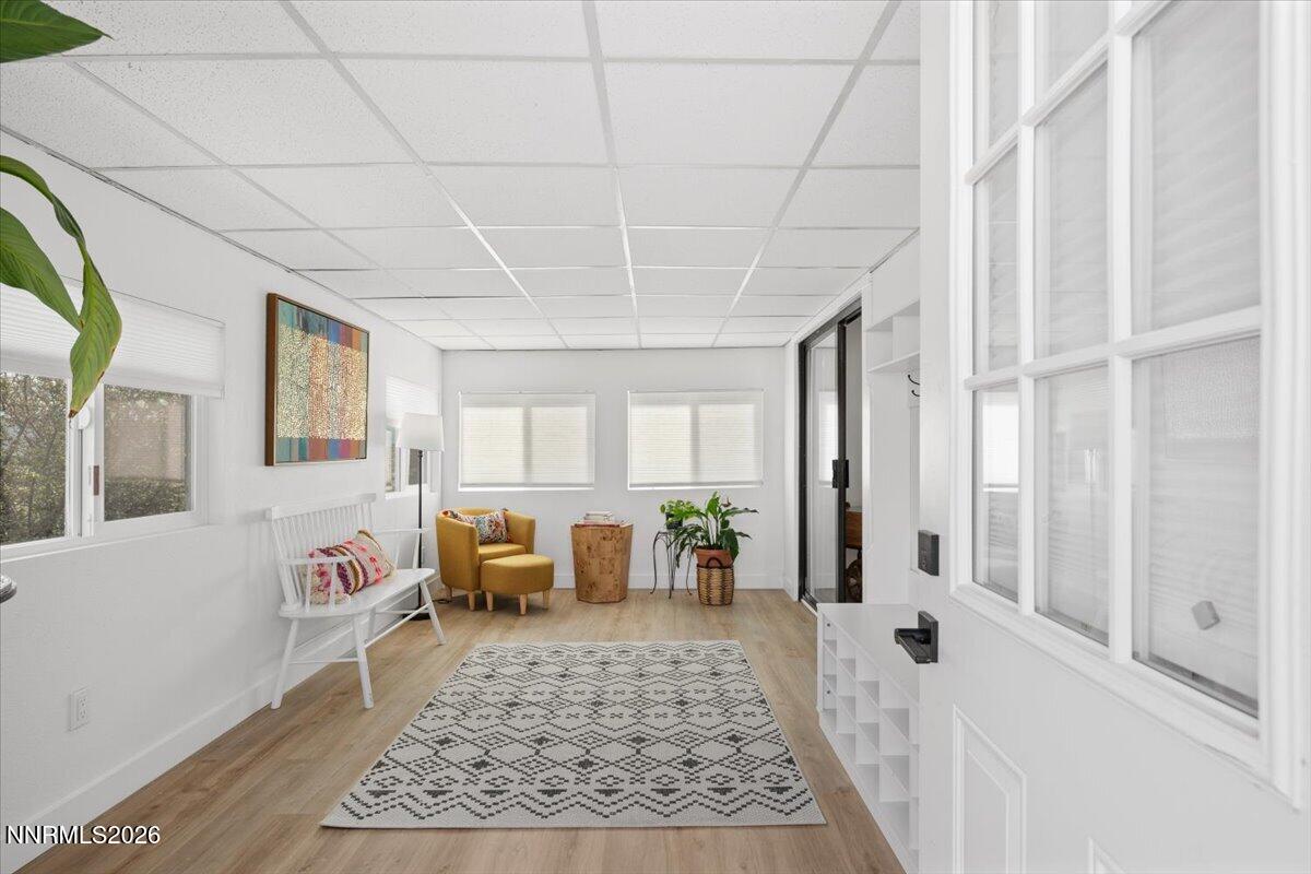 384 Loster Way Sun Valley, NV 89433 - Photo 4 of 35 a spacious bedroom with a bed and a couch