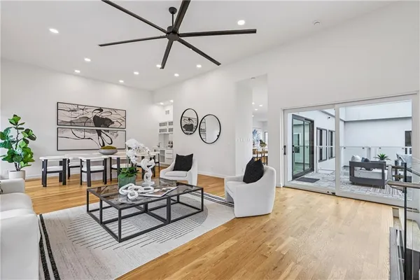 an open kitchen with a table and chairs