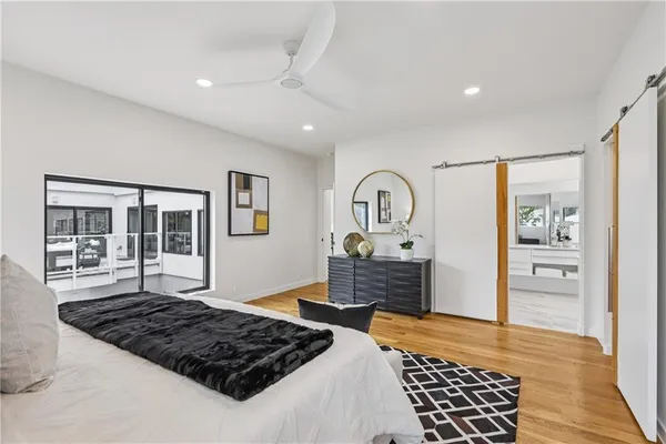 a work room with furniture and wooden floor