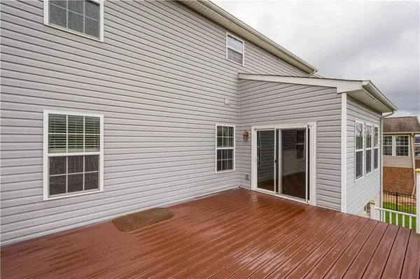 a view of a house with deck