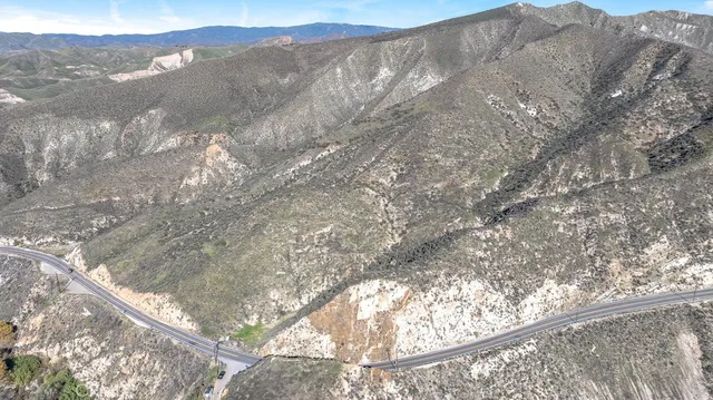 a view of a yard from a balcony