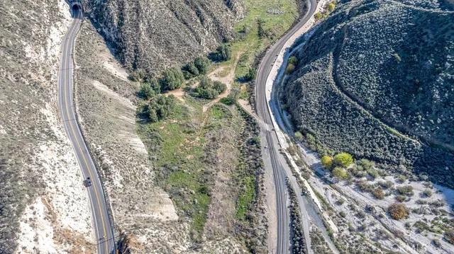 a view of a yard and front view of a house