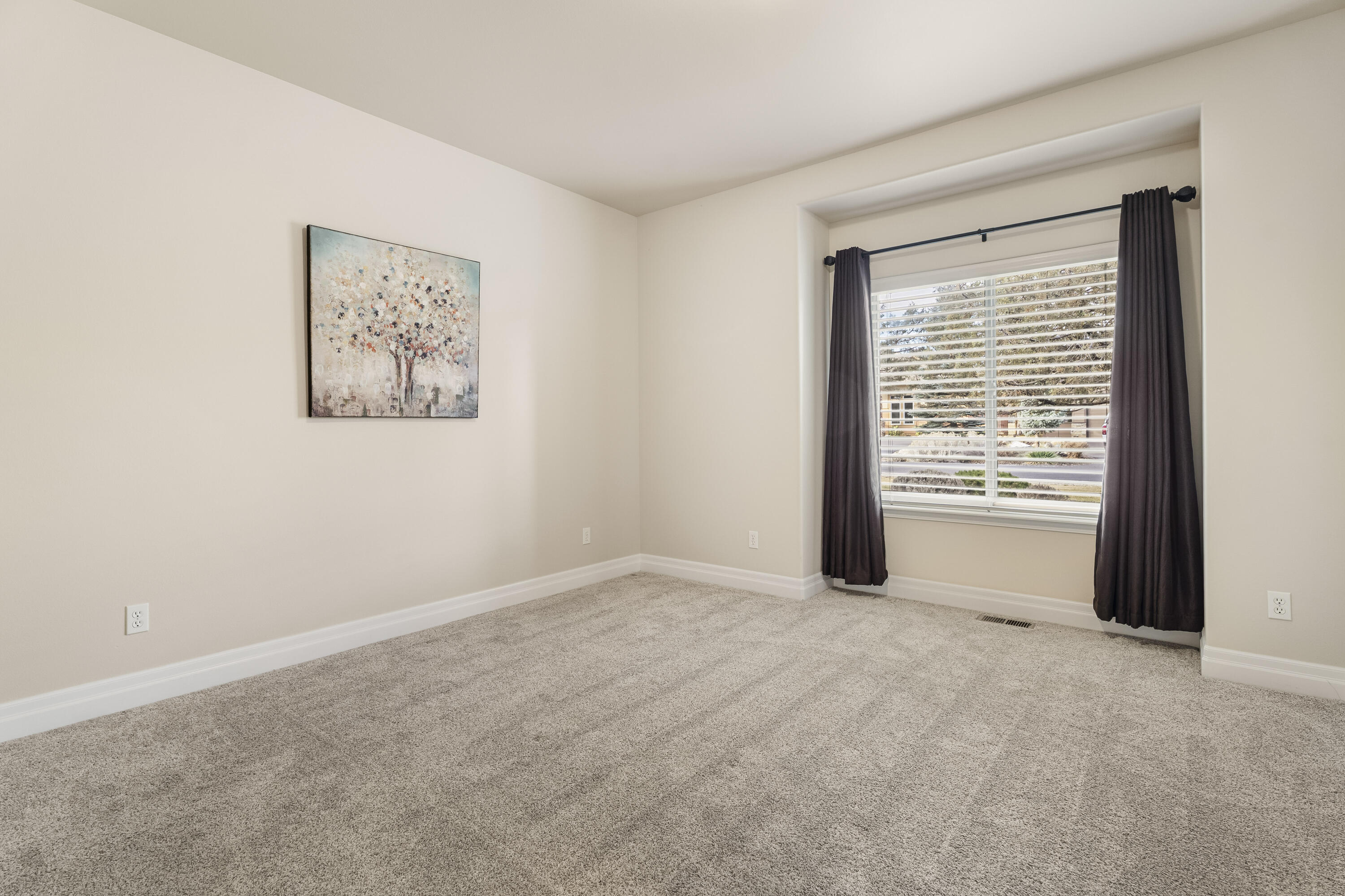 784 Ribbon Falls Road Redmond, OR 97756 - Photo 13 of 79 a view of an empty room with a window