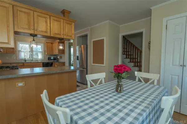 a view of a dining room with furniture