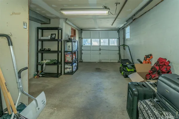 a room with lots of stuff and furniture