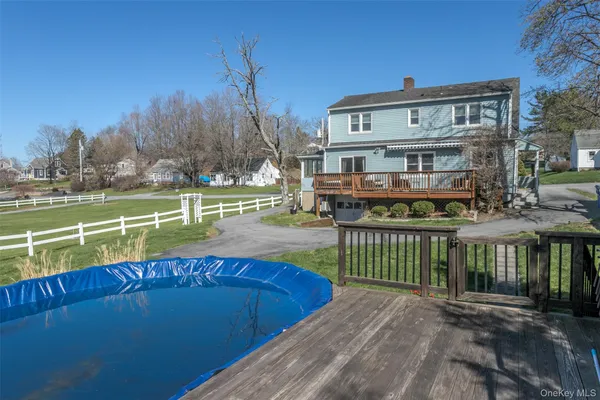 a view of a swimming pool with a patio