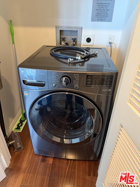 3785 Wilshire Boulevard, Unit 1504 Los Angeles, CA 90010 - Photo 5 of 9 a utility room with washing machine