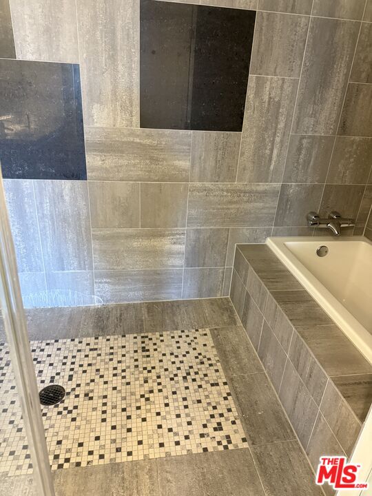 3785 Wilshire Boulevard, Unit 1504 Los Angeles, CA 90010 - Photo 7 of 9 a bathroom with a shower