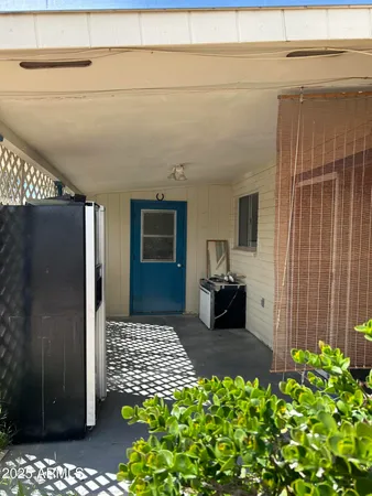 a view of a entryway door of the house and front door