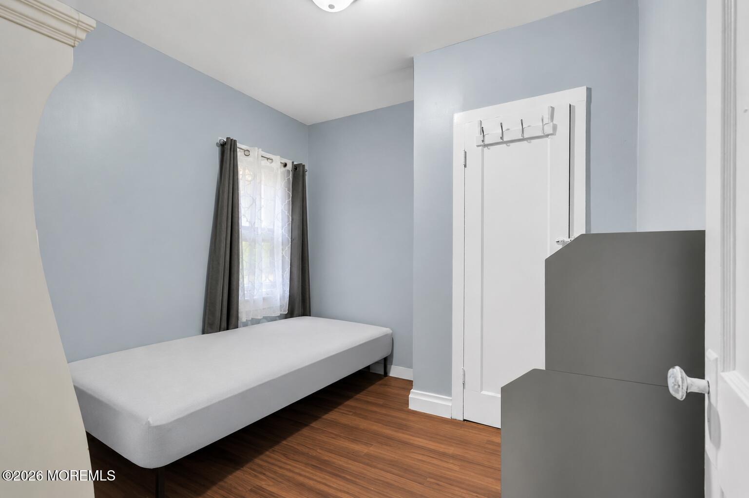269 Alexander Avenue Howell, NJ 07731 - Photo 20 of 43 a bedroom with a bed and a mirror