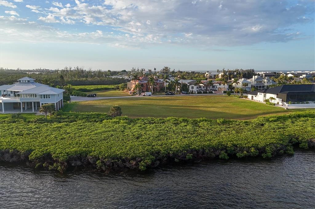5248 The Pointe Englewood, FL 34223 - Photo 17 of 20 a view of a lake with houses