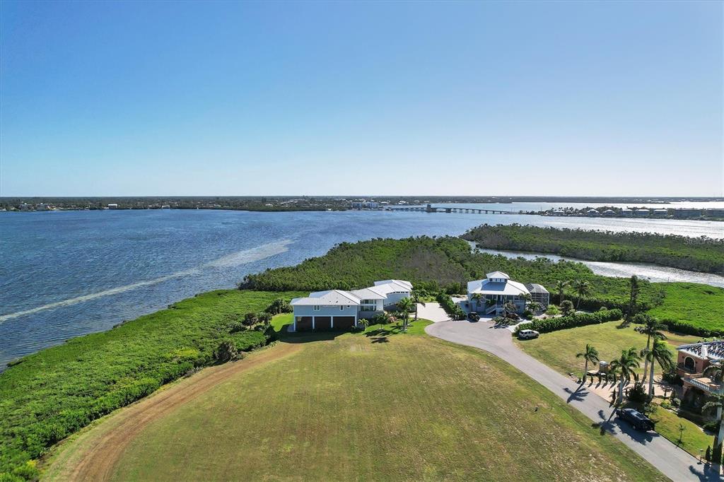 5248 The Pointe Englewood, FL 34223 - Photo 3 of 20 an aerial view of a house with a garden