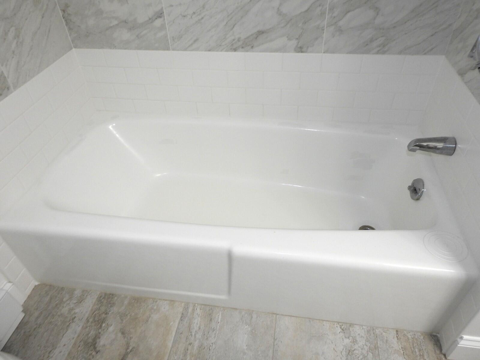 307 West Main Street, Unit 7 Hyannis, MA 02601 - Photo 10 of 15 a bathroom with a bathtub