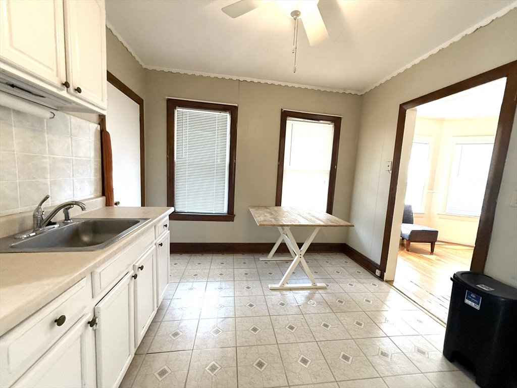 53 Litchfield Street, Unit 53 Boston, MA 02135 - Photo 11 of 14 a view of a bathroom with dual sinks