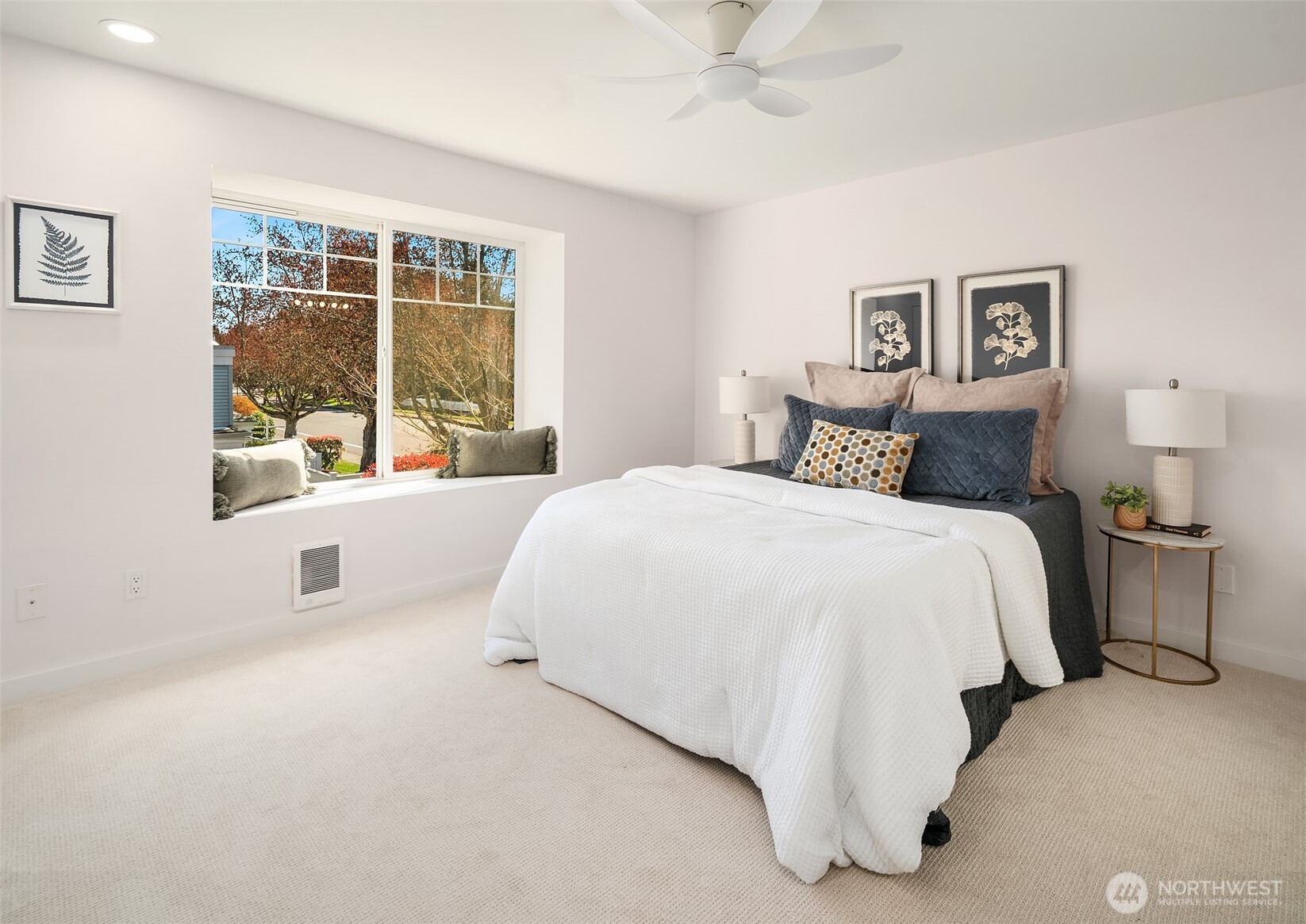 5505 South 236th Place Kent, WA 98032 - Photo 11 of 24 a bedroom with a large bed and a window