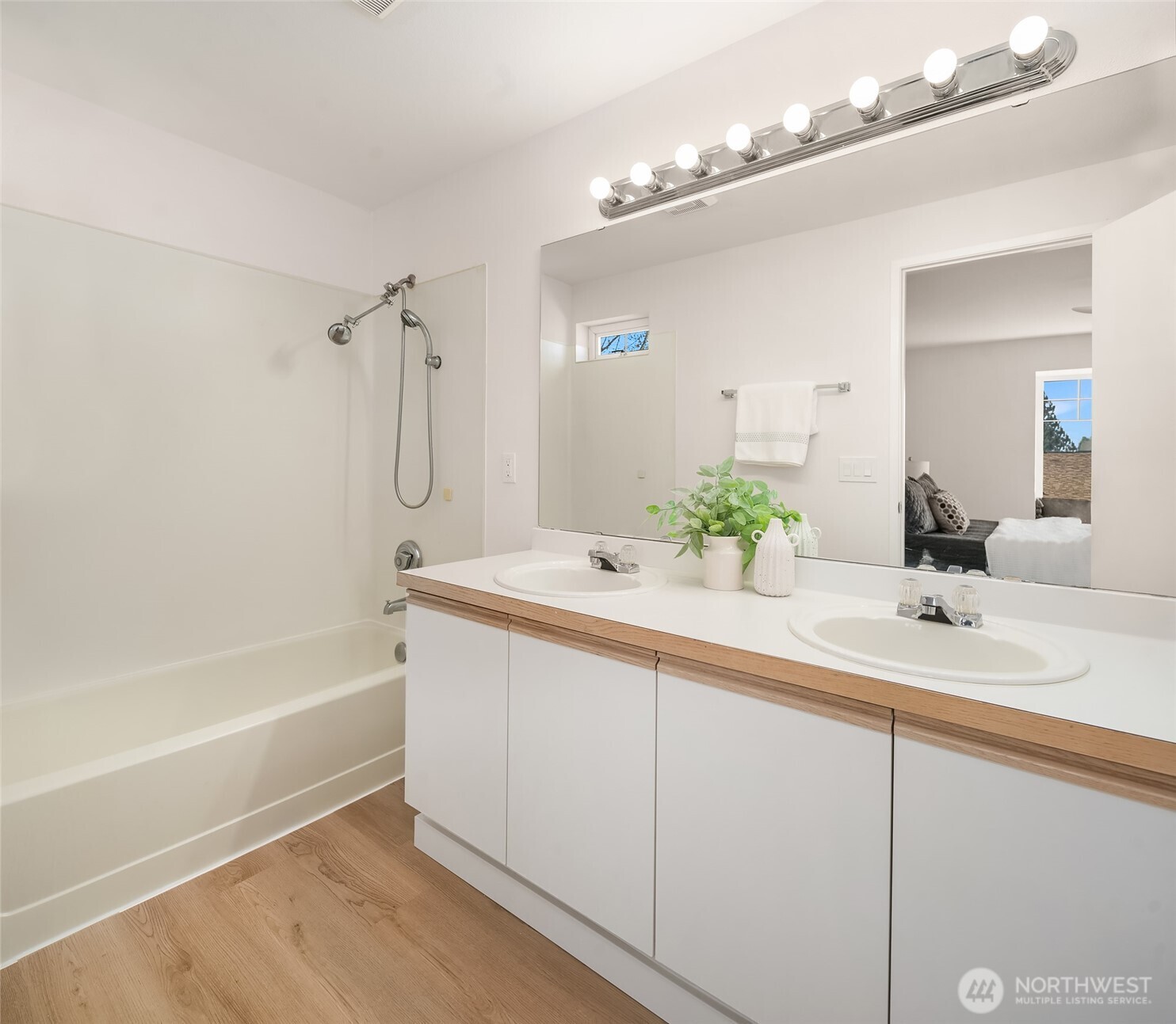 5505 South 236th Place Kent, WA 98032 - Photo 13 of 24 a bathroom with a tub sink and mirror
