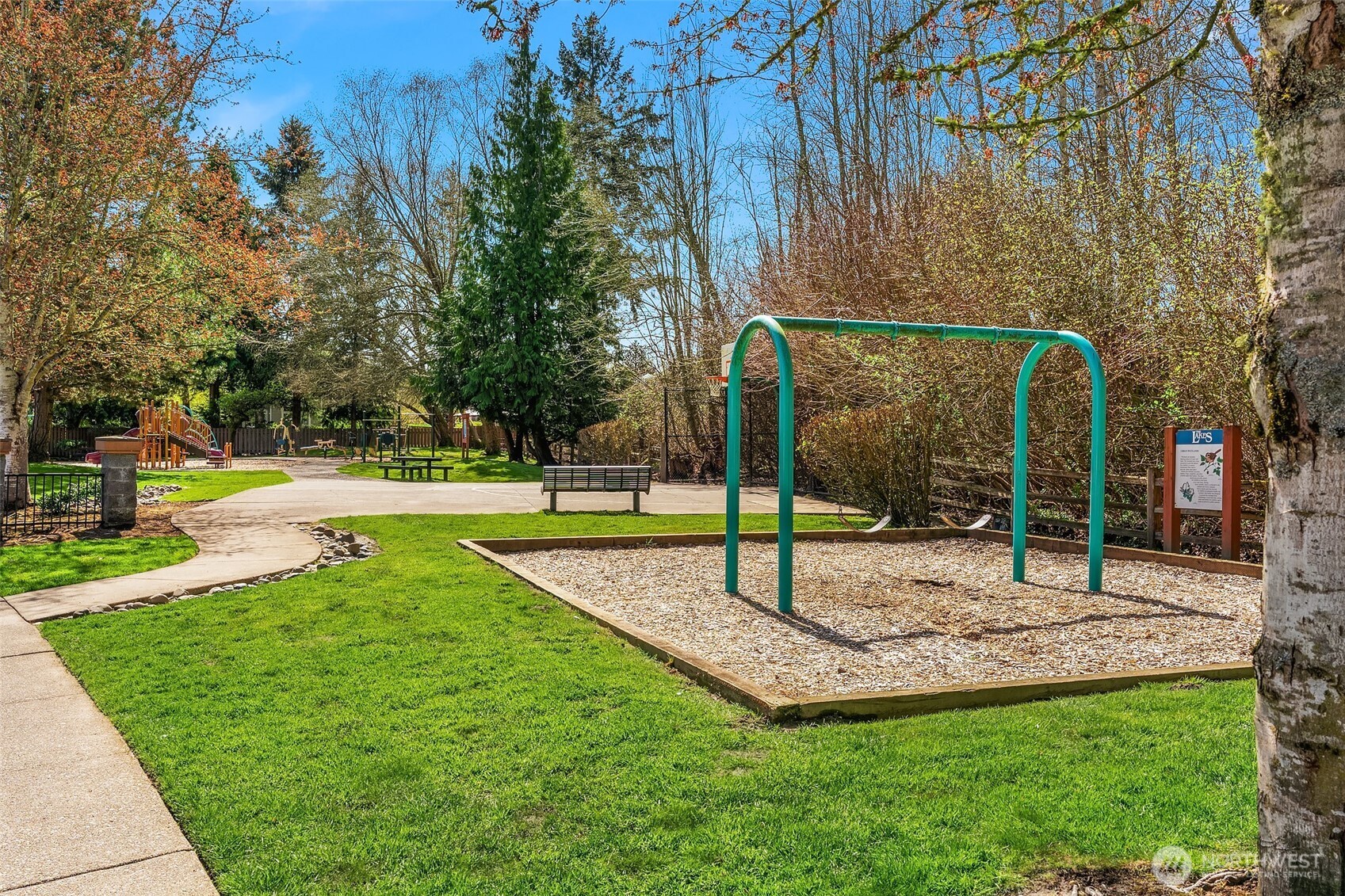 5505 South 236th Place Kent, WA 98032 - Photo 20 of 24 a view of a park with swings