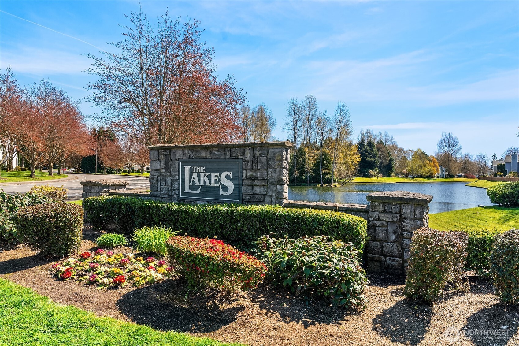 5505 South 236th Place Kent, WA 98032 - Photo 23 of 24 a view of a garden with flowers and trees