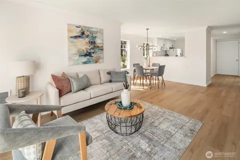 a living room with furniture and a table