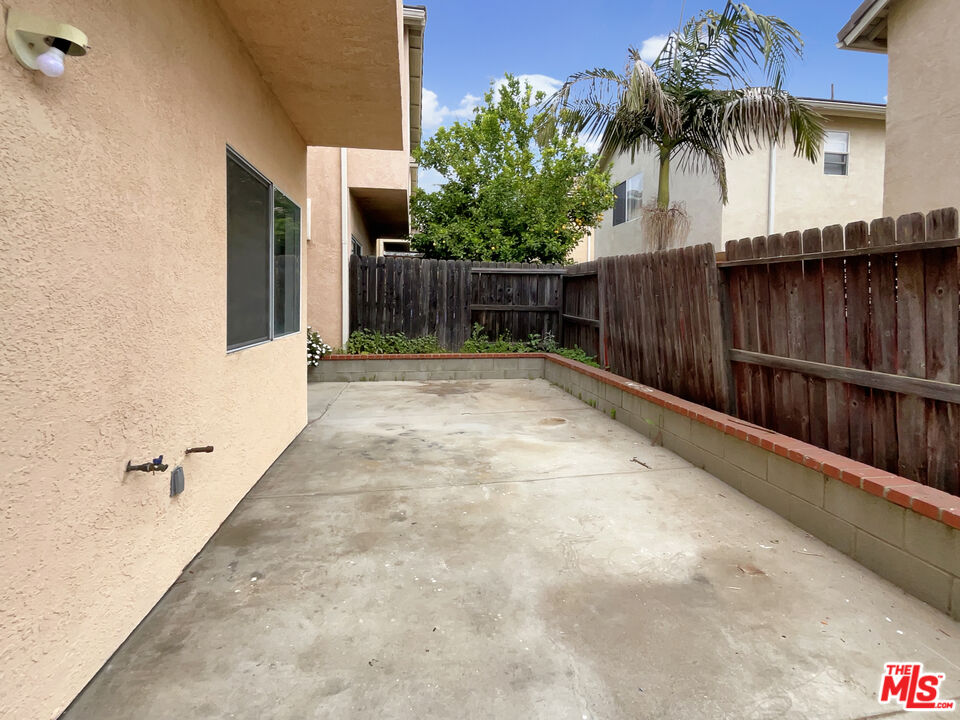 15232 Foothill Boulevard, Unit 111 Sylmar, CA 91342 - Photo 6 of 19 a view of a backyard