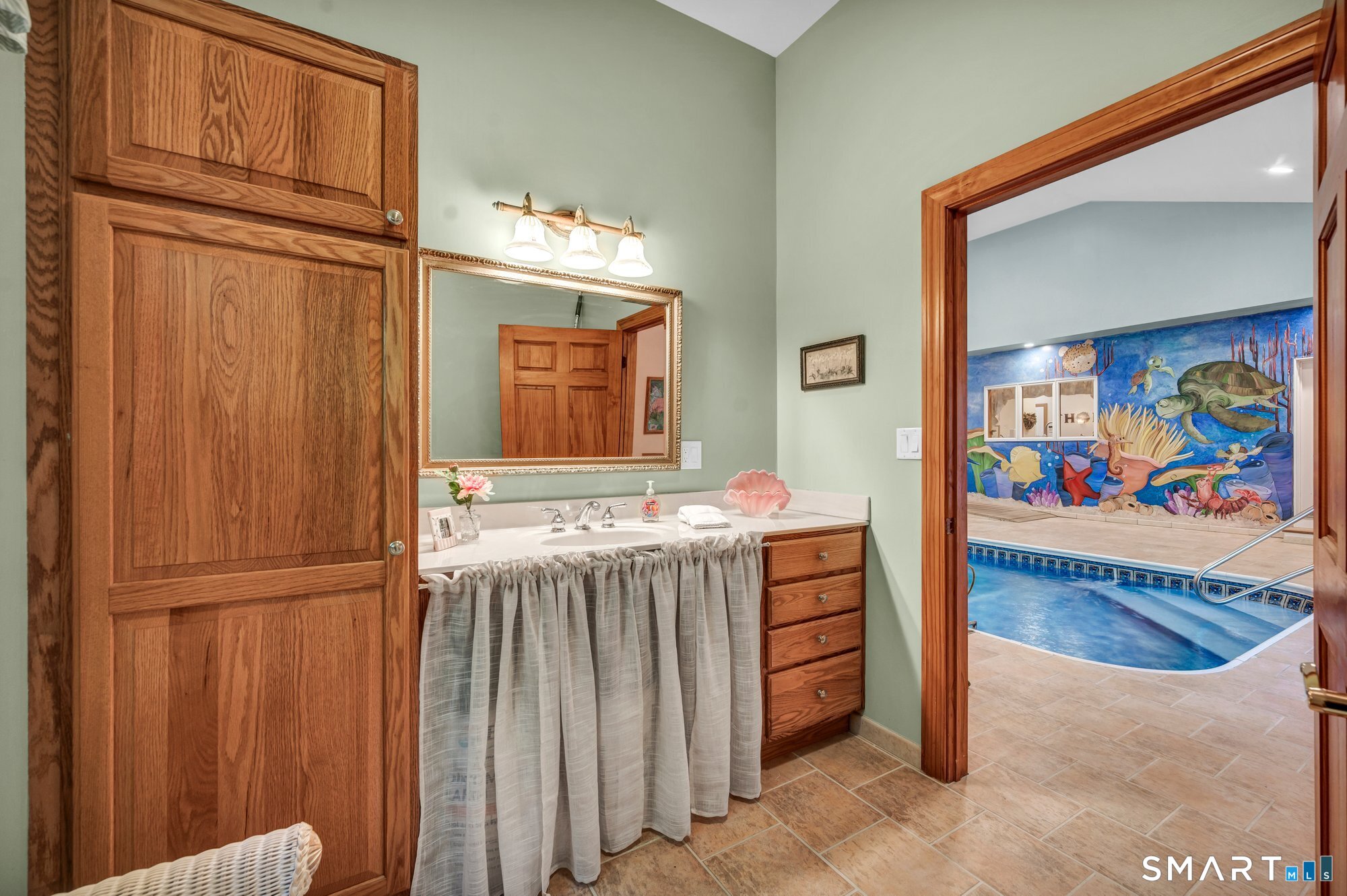 270 Copper Ridge Southington, CT 06489 - Photo 18 of 40 Half bathroom conveniently located off the indoor pool room.