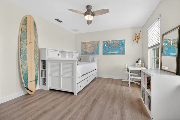 a view of livingroom with furniture wooden floor and window
