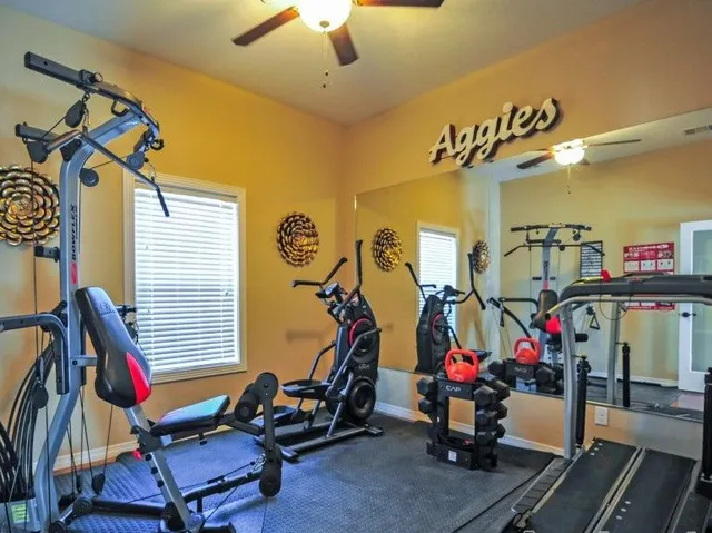 a view of a room with gym equipment