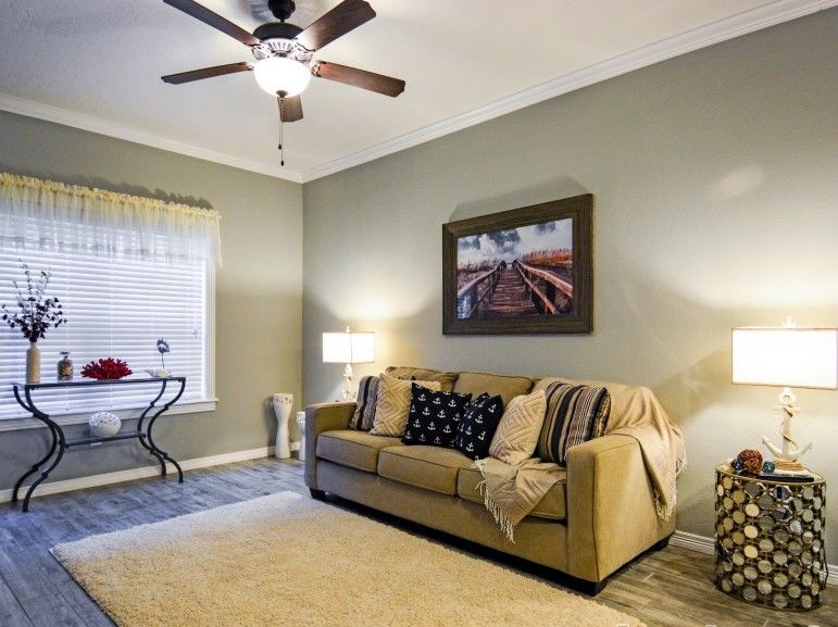 301 Southwest Parkway, Unit 314 College Station, TX 77840 - Photo 4 of 14 a living room with furniture and a large window